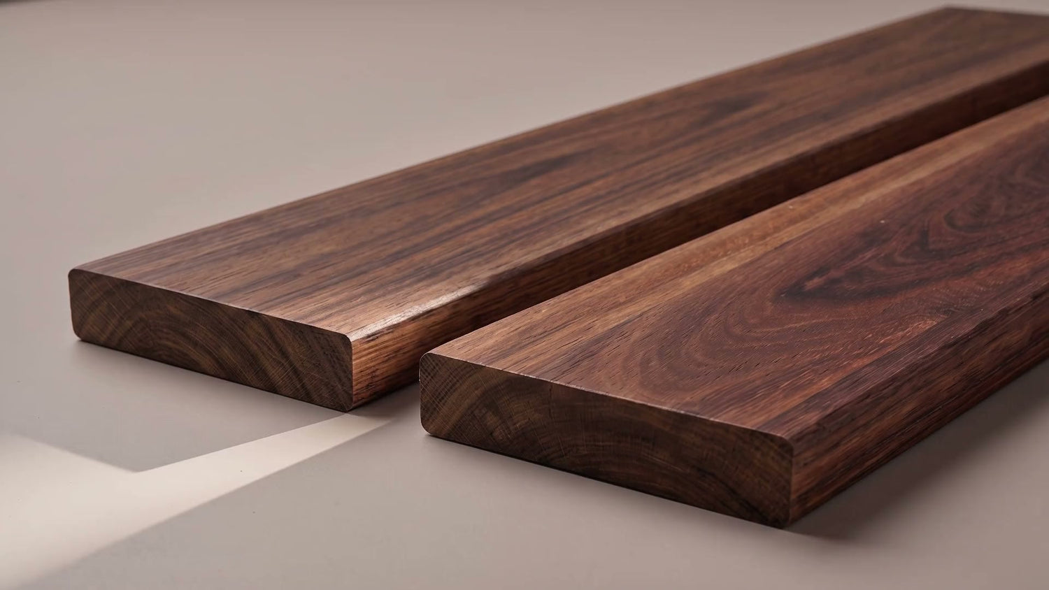 Red Ironbark hardwood boards on a warm ground - homepage hero poster frame